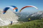 DOUBLESKIN - Minimalist hike & fly The DOUBLESKIN is the lightest paraglider in the world* with top and under surface (2.1 kg / size 17). It has a very small pack size and is a delight in the air thanks to better aerodynamics compared to a single-surface wing. With the DOUBLESKIN walking up is as enjoyable as flying and landing!