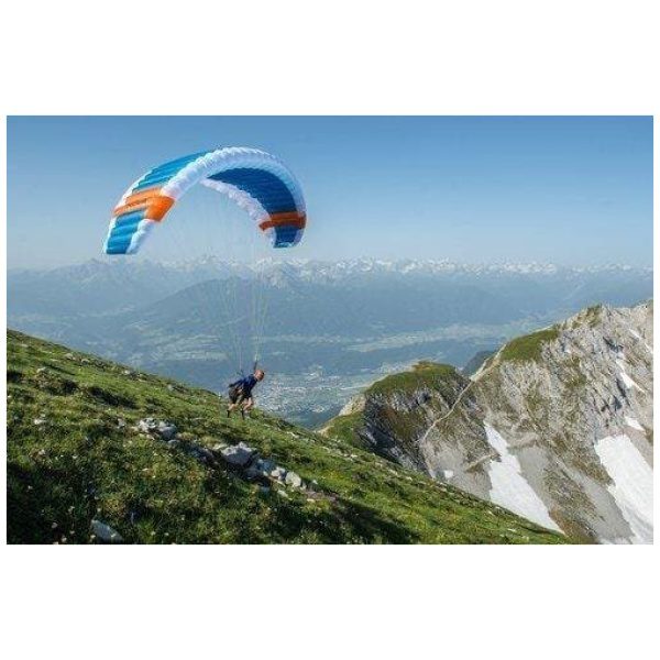 DOUBLESKIN - Minimalist hike & fly The DOUBLESKIN is the lightest paraglider in the world* with top and under surface (2.1 kg / size 17). It has a very small pack size and is a delight in the air thanks to better aerodynamics compared to a single-surface wing. With the DOUBLESKIN walking up is as enjoyable as flying and landing!