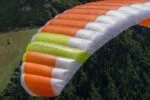 DOUBLESKIN - Minimalist hike & fly The DOUBLESKIN is the lightest paraglider in the world* with top and under surface (2.1 kg / size 17). It has a very small pack size and is a delight in the air thanks to better aerodynamics compared to a single-surface wing. With the DOUBLESKIN walking up is as enjoyable as flying and landing!